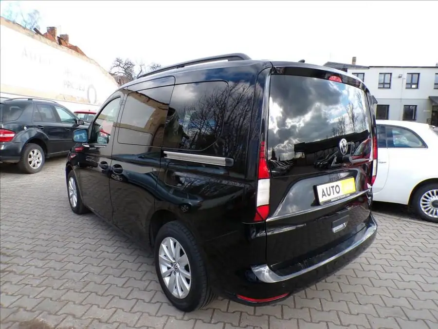 Volkswagen Caddy 2,0 TDI  SERVISNÍ KNIHA — Zezadu zprava