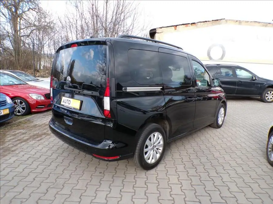 Volkswagen Caddy 2,0 TDI  SERVISNÍ KNIHA — Zezadu zleva