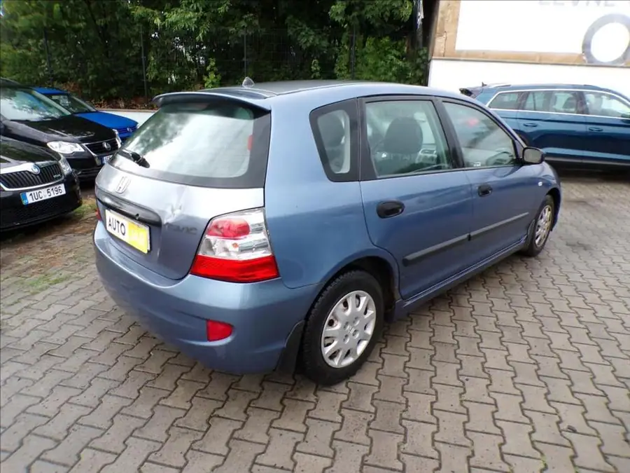Honda Civic 1,4 i  KLIMA — Zezadu zleva